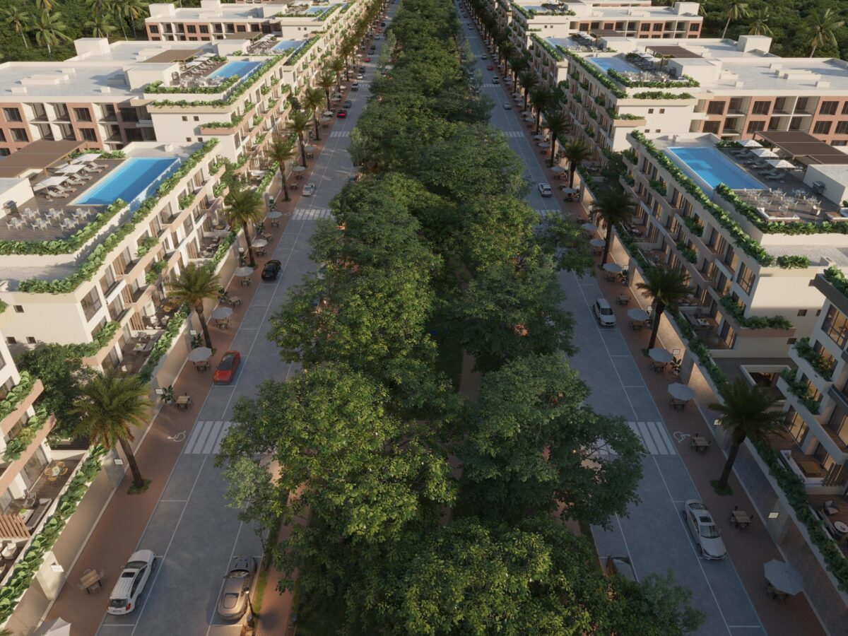 Avenida botánica y edificios de City Place Luxury Condos en el centro de Punta Cana, a 5 minutos del aeropuerto