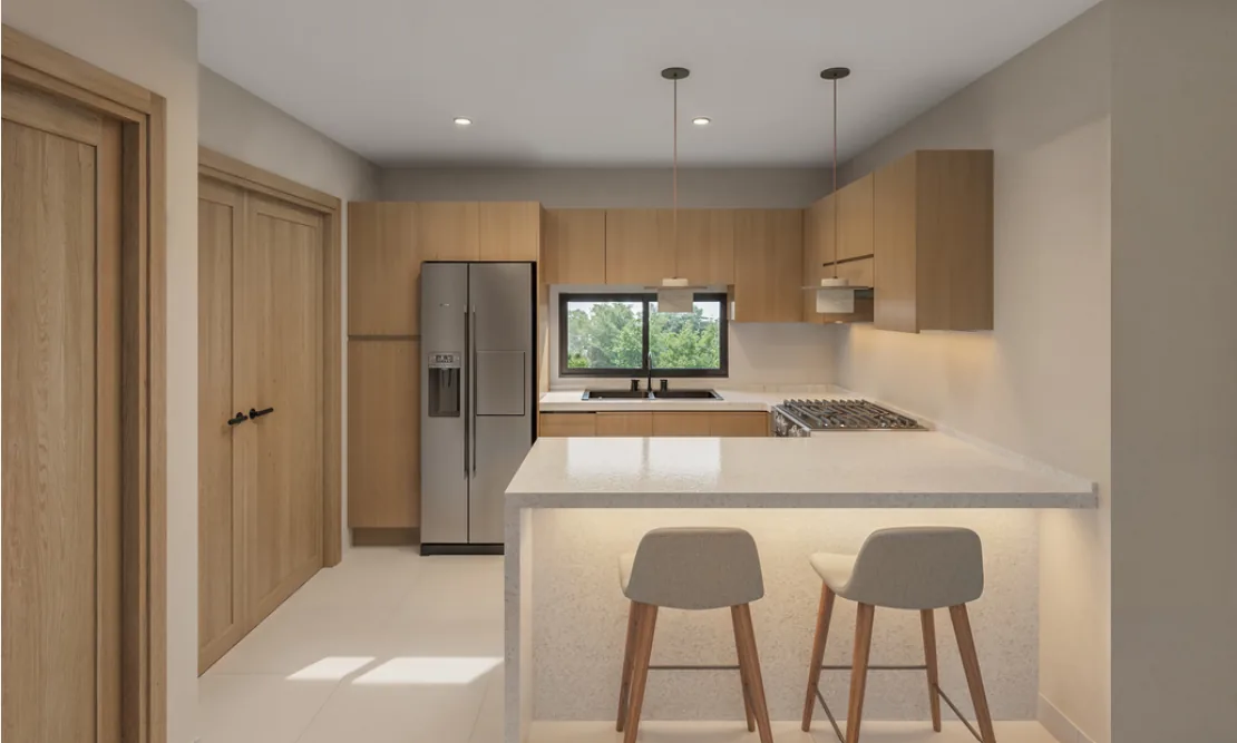 Cocina con desayunador de un apartamento en Bávaro