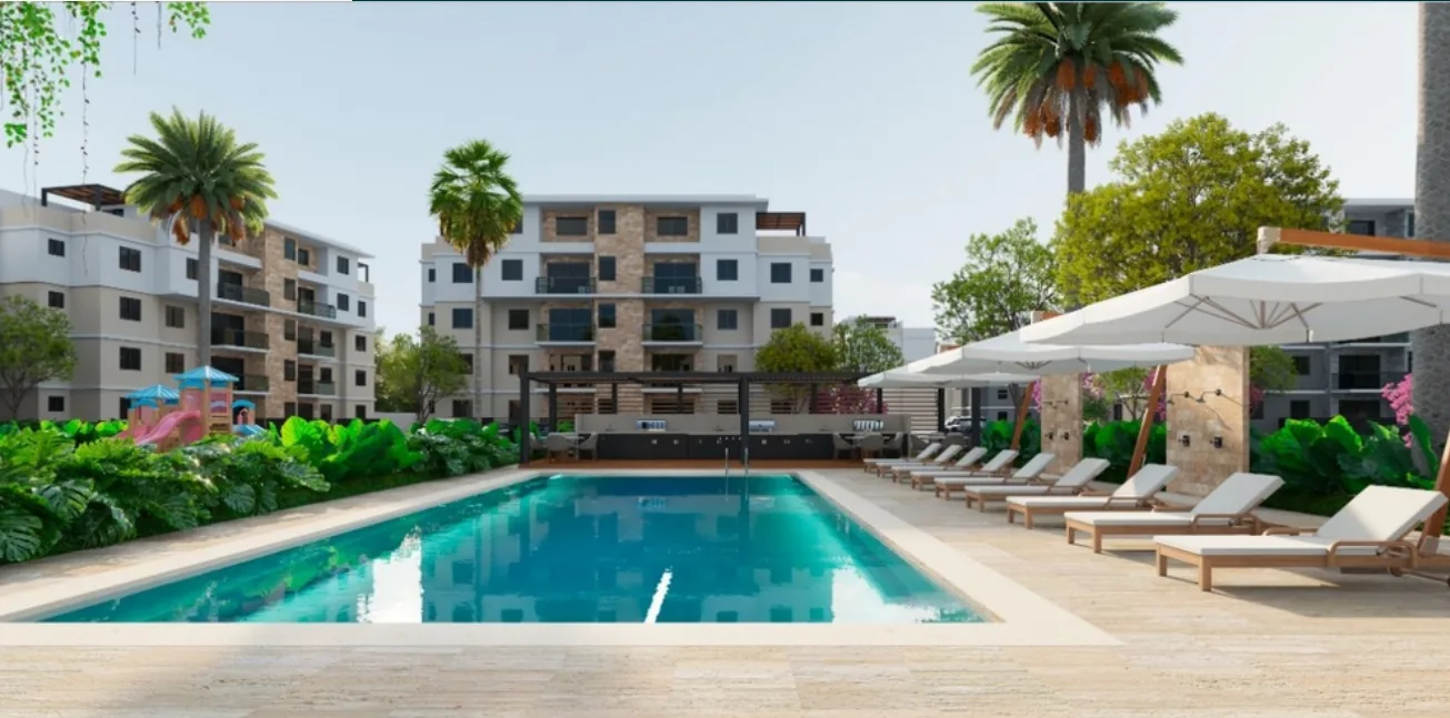 Piscina y edificios de Costa Caribe Punta Cana, apartamentos en preventa en Bávaro