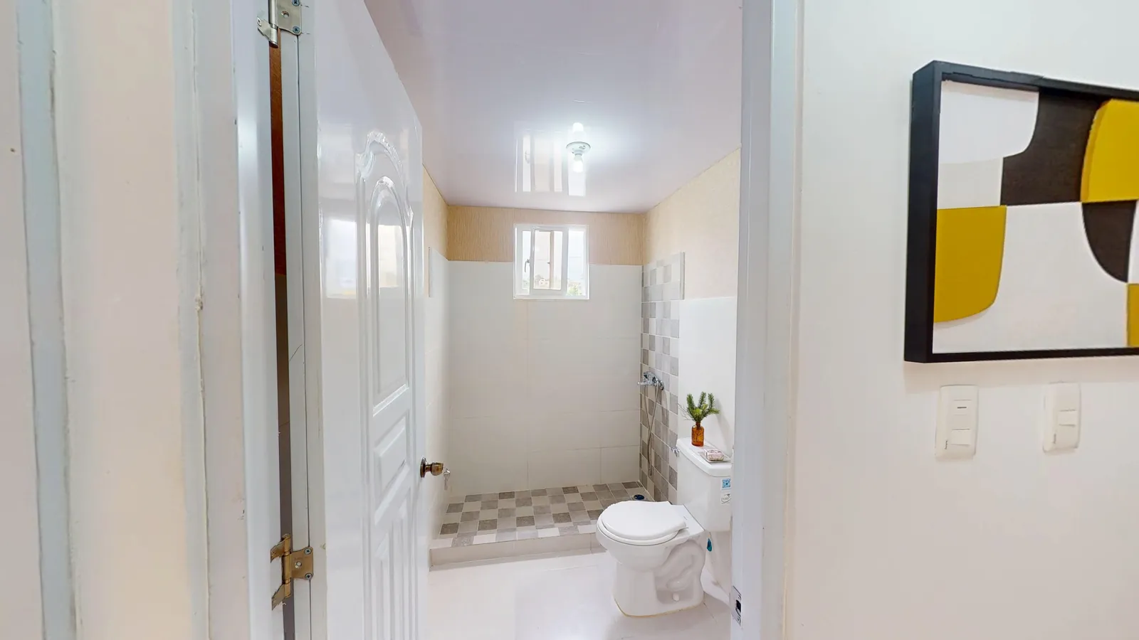 Baño del apartamento modelo del Residencial Don Galo J. Mariot