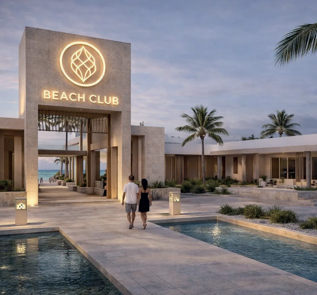 Entrada del Beach Club de Cruise On Land Punta Cana con espejo de agua