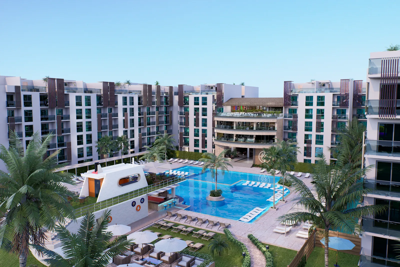 Piscina central y jardines entre los edificios de un condohotel de Cruise On Land Punta Cana