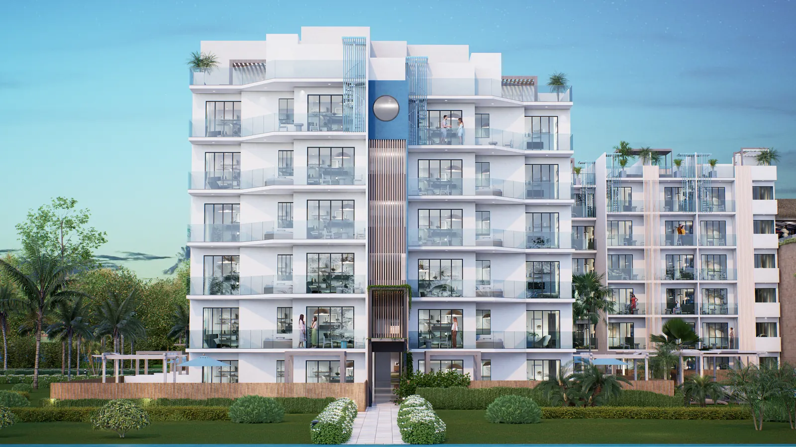 Fachada blanca de seis niveles de un condohotel de Cruise On Land Punta Cana