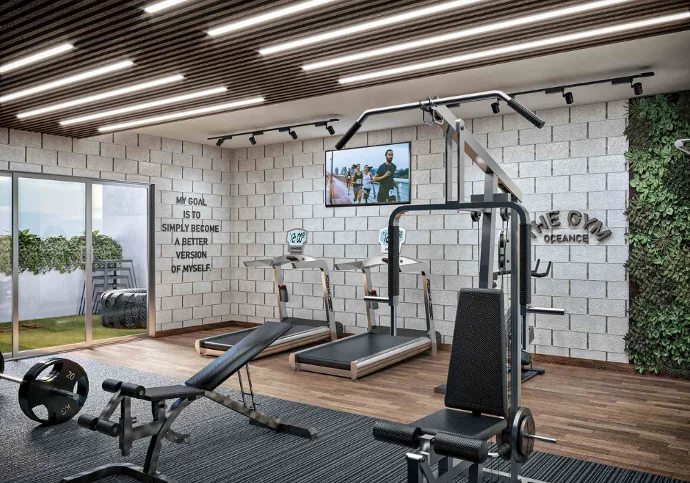 Gimnasio con equipos de fuerza y cardio en Civil Tower Oceance