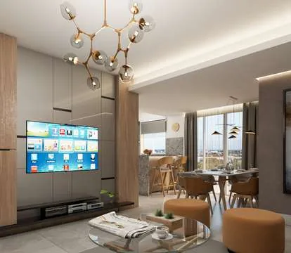 Sala, comedor y cocina abierta de un apartamento de Julio Adriano Residences
