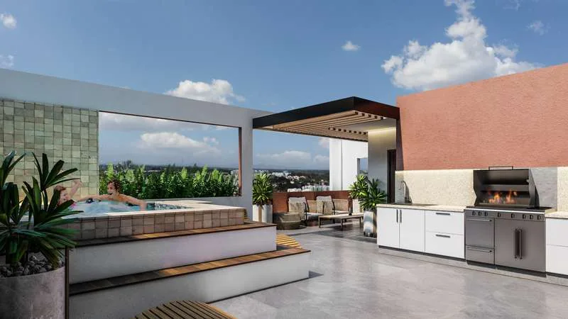 Terraza con jacuzzi y área de BBQ en Julio Adriano Residences