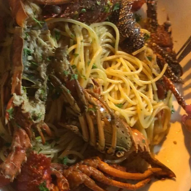 Plato de espaguetis con langosta en el restaurante Trastevere de Boca Chica