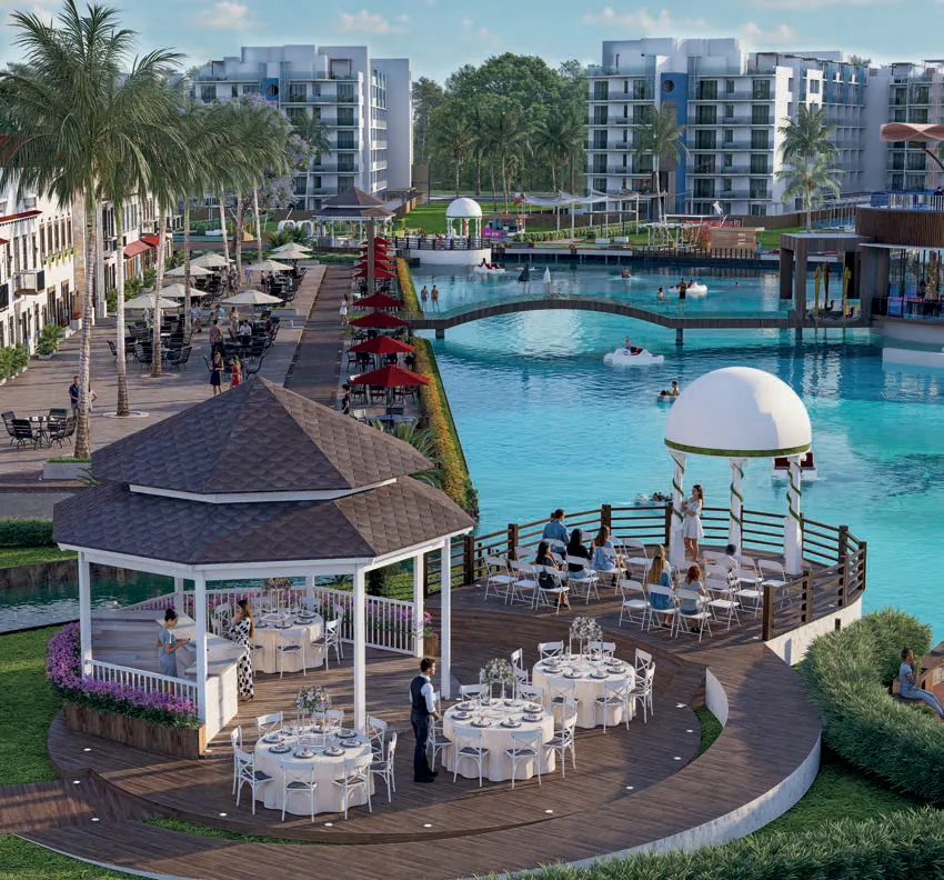 Zona de eventos junto al lago de Cruise On Land Punta Cana con gazebo y mesas